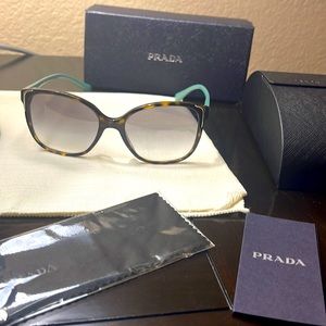 NWT Prada sun glasses never used.